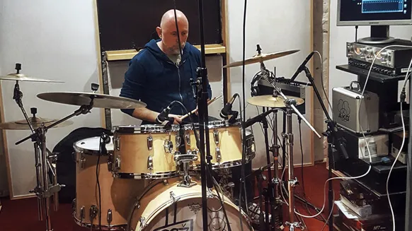A drummer recording